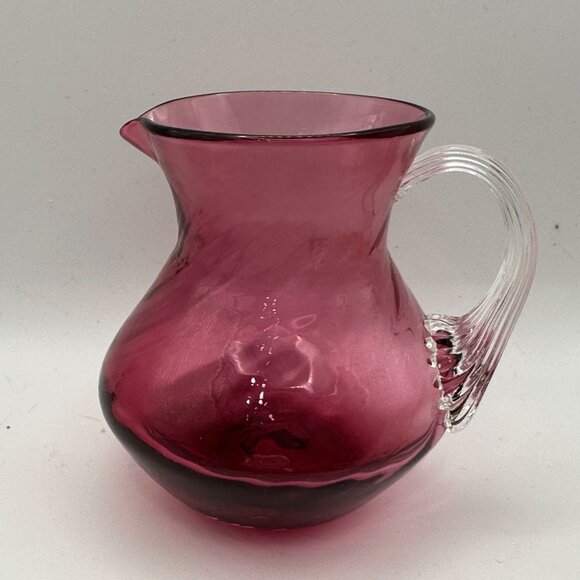 Unbranded hand blown cranberry w/ clear applied handle 3.75” mini glass pitcher - Picture 1 of 7